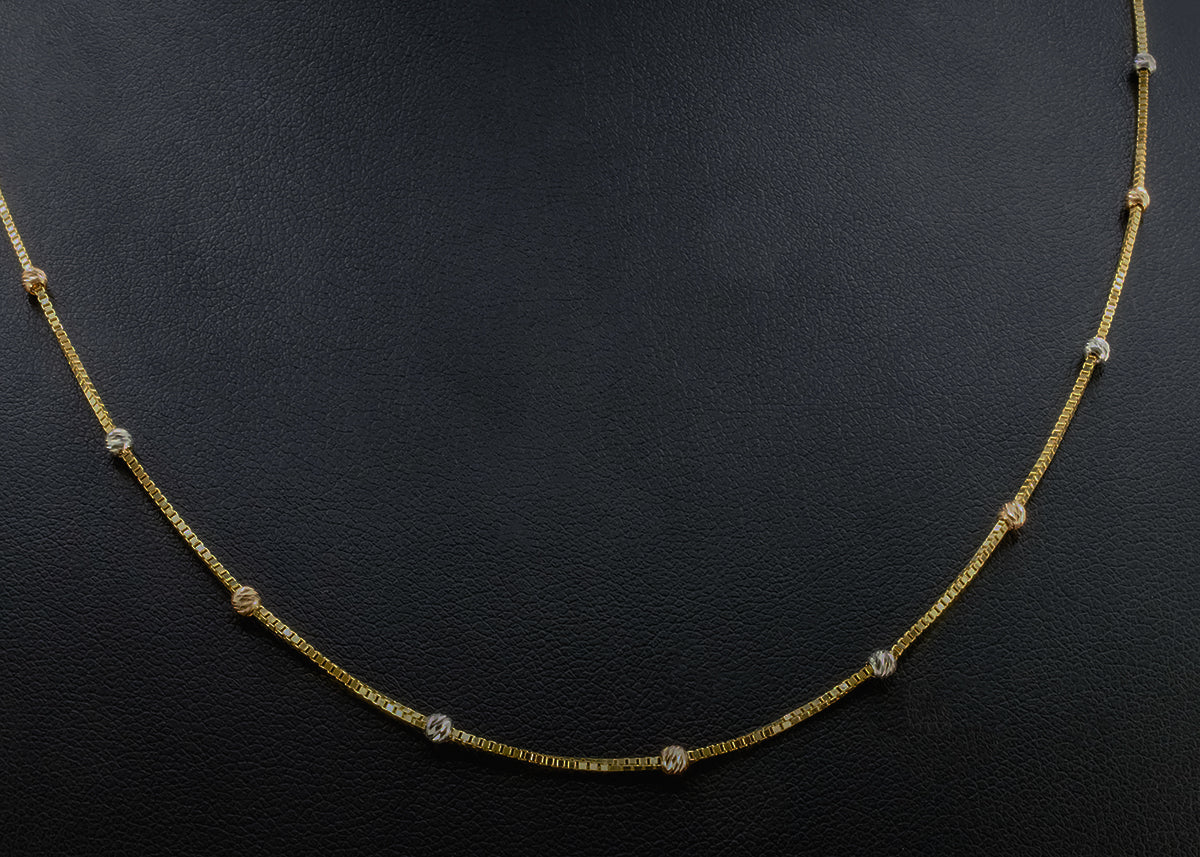 Cadena de bolitas en 3 oros 14k