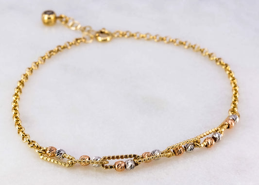 Pulsera con esferas de 2 oros 14k
