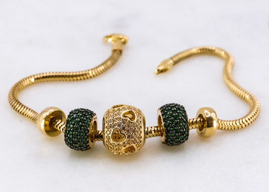 Pulsera tipo pandora con charms 14k