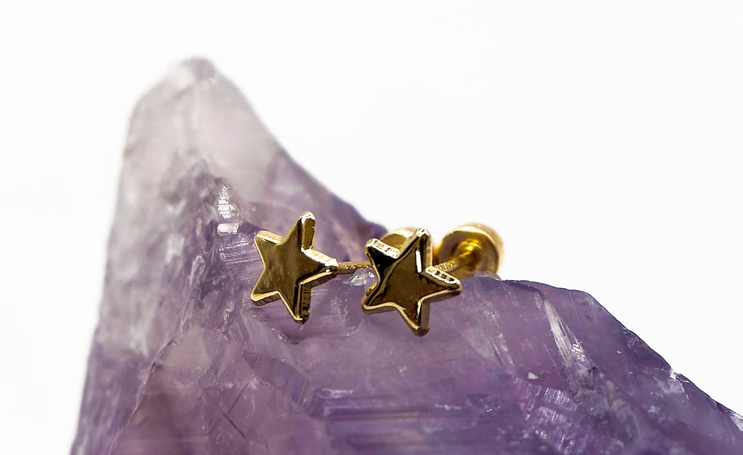 Aretes tipo broquel de estrella 14k
